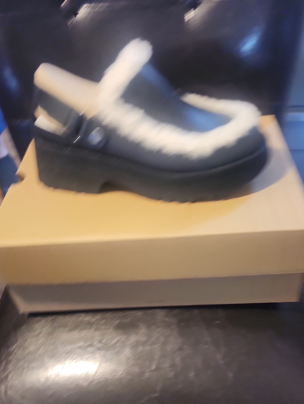UGG Black Leather Clog with Cream Shearling Trim